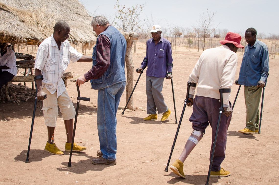 Landmine survivors practice walking on their new prosthetics, HALO Trust