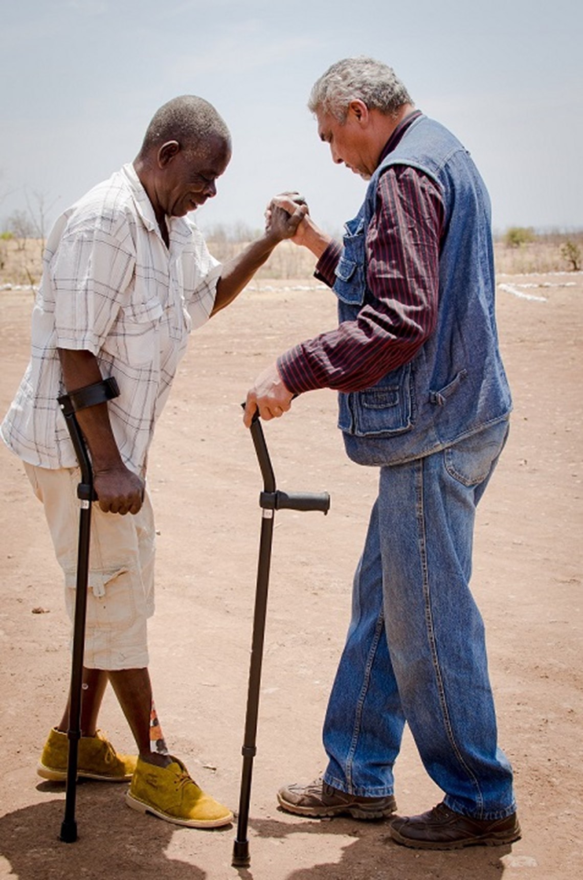 Landmine survivor practices walking on their new prosthetic, Zimbabwe, HALO Trust