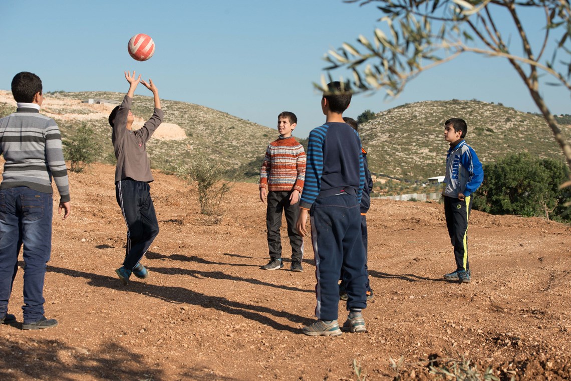Karam and his friends play on formerly mined land, HALO Trust.