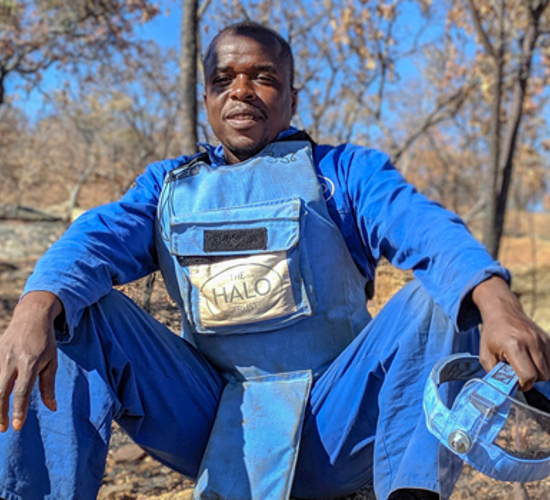Bonface Chinaka, HALO Zimbabwe Deminer wearing PPE