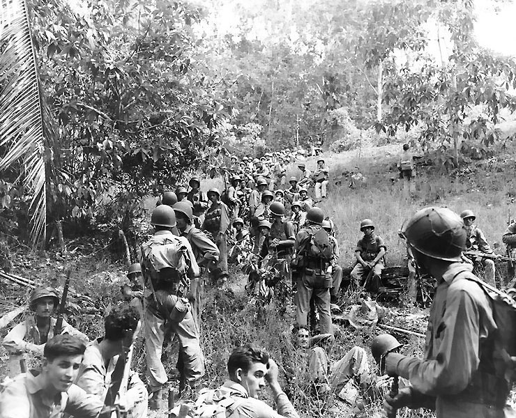 US Marines rest in the fields in Guadacanal during the Second World War