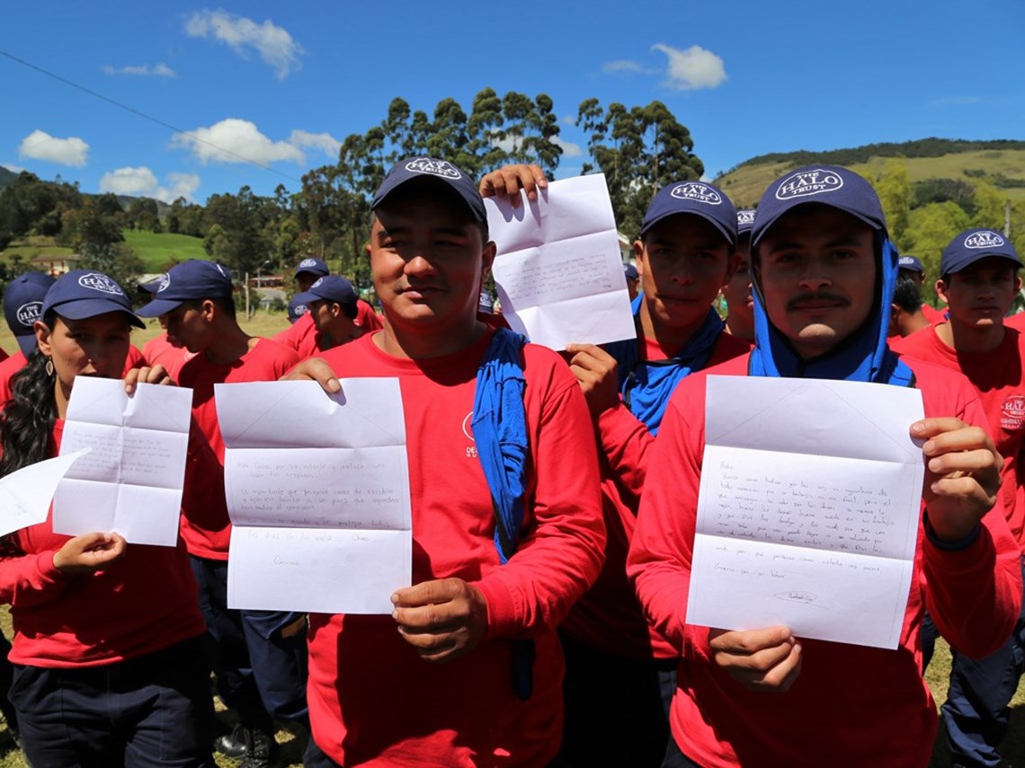 Colombian deminers with letters from our letter campaign, HALO Trust.