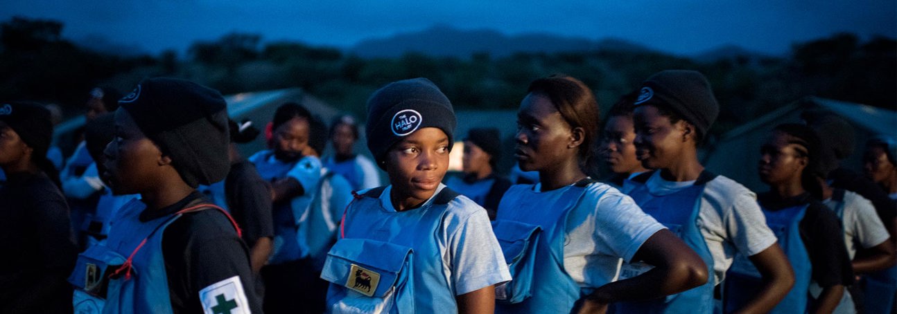 Female demining team begin the day of work with a morning parade in Angola 