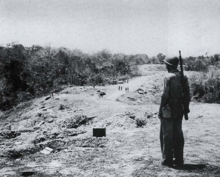 Black and white picture of World War II soldiers positioned on the Bloody Ridge