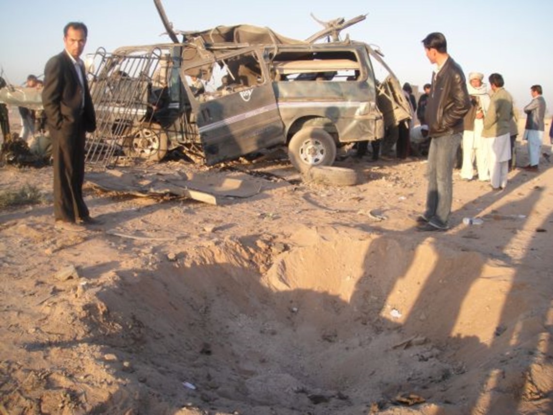 A minibus destroyed by an anti-vehicle mine