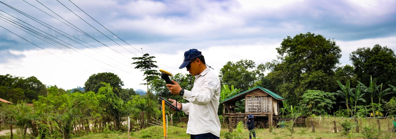 Laos deminer with Trimble transmitter