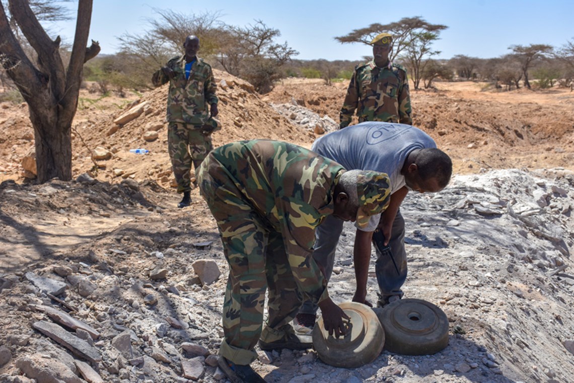 HALO’s Operations Officer and members of the Somaliland Armed Forces examine the anti-tank mines to be used