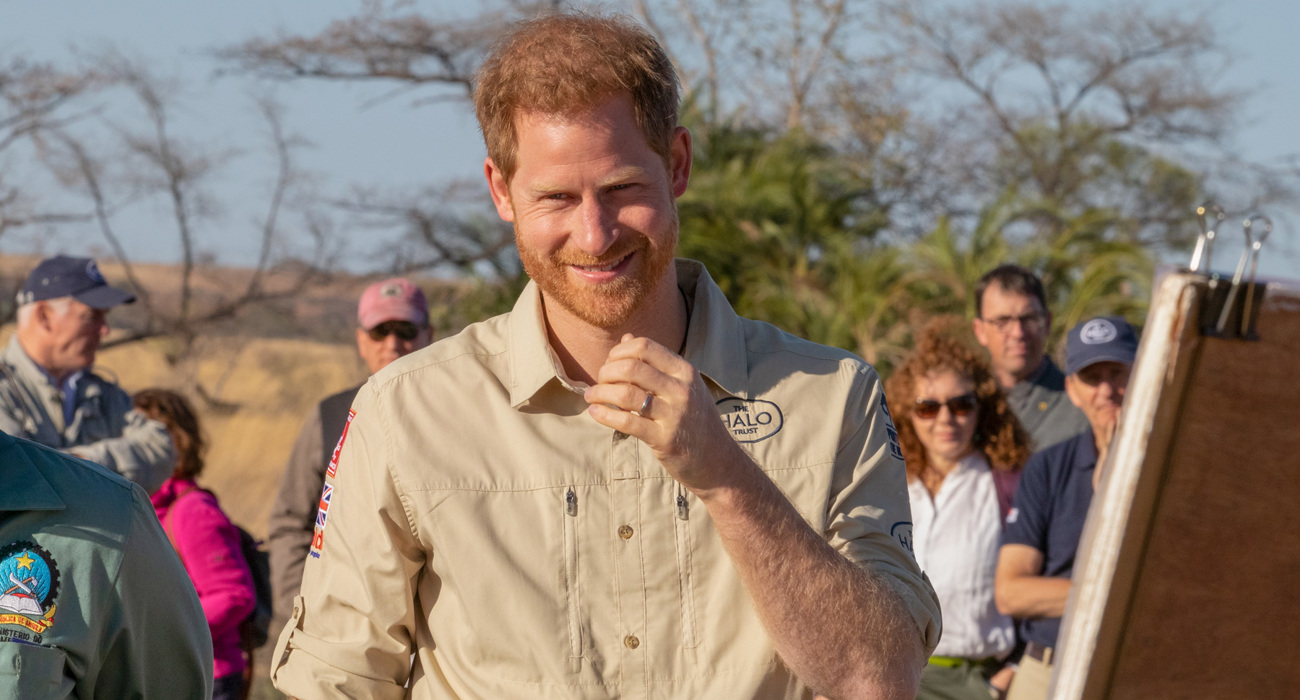 Prince Harry smiles during a briefing in Angola
