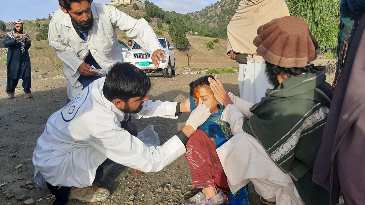 HALO medics treat an injured child after the Khost Earthquake