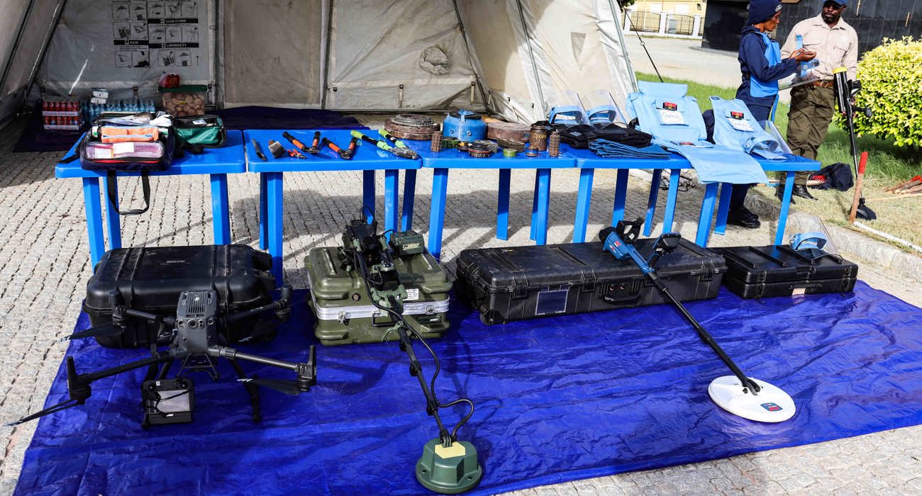 A table containing a variety of technical equipment used by HALO Angola including detectors and drones