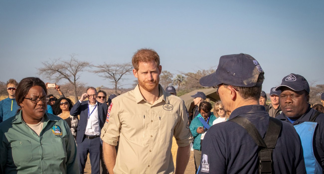 Senior HALO Trust Staff member, Tom Dibb, provides Prince Harry with a safety brief in Angola