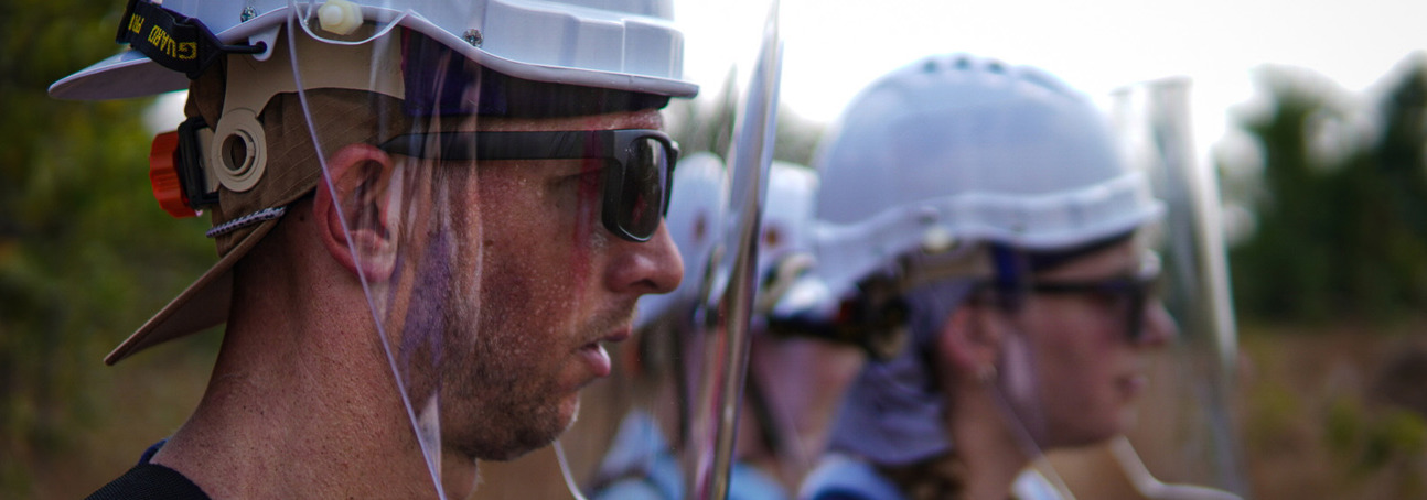 HALO staff wearing visors in the field
