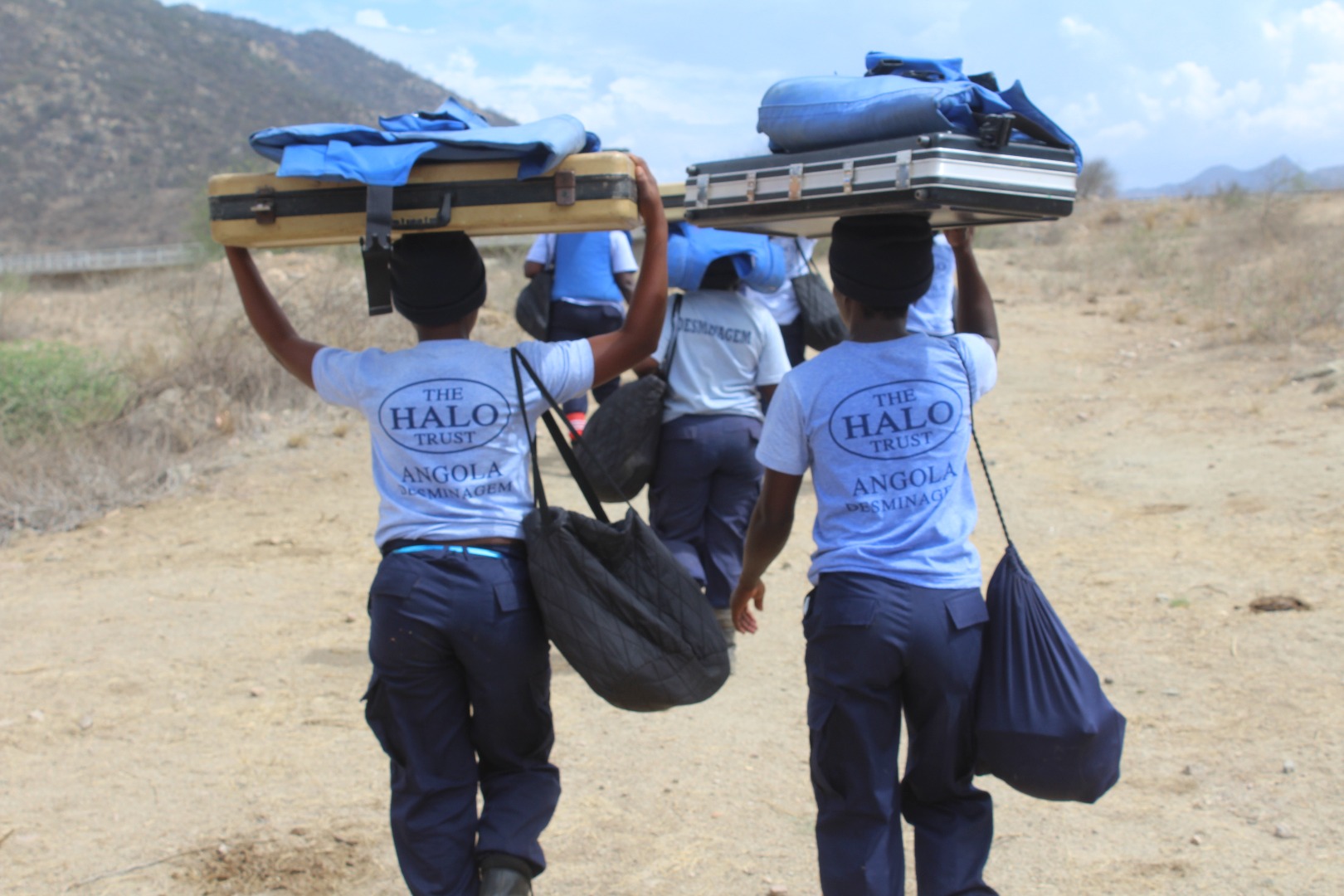angola-100-women-in-demining-carry kit-the-halo-trust