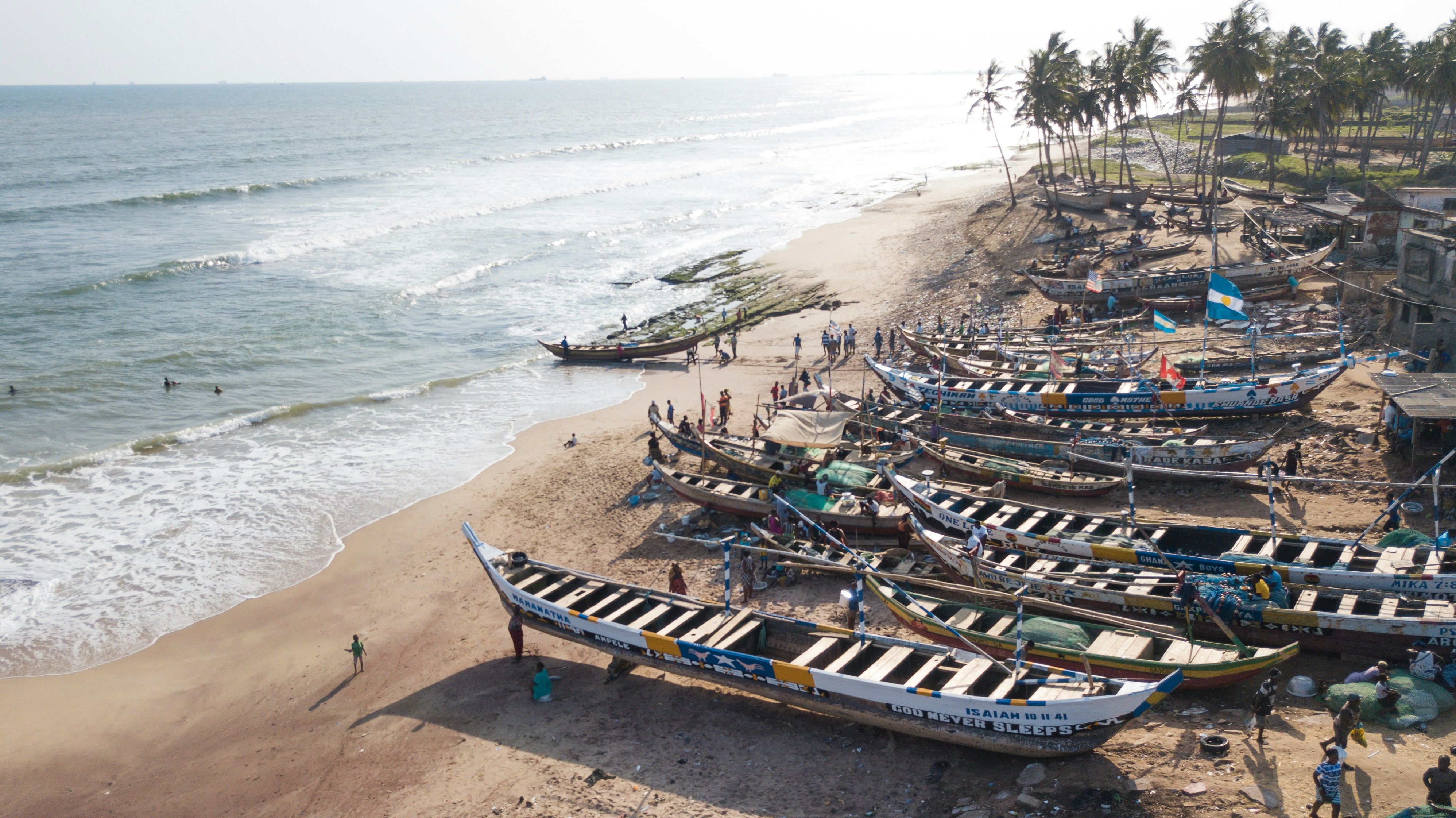 Small wooden boats on the sea in Ghana