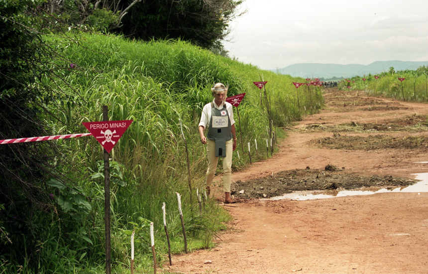 Princess Diana walking through a minefield in Angola in 1997