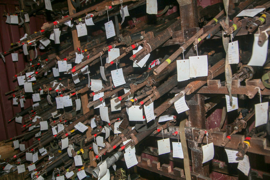weapons with tags sit in ammunition stores