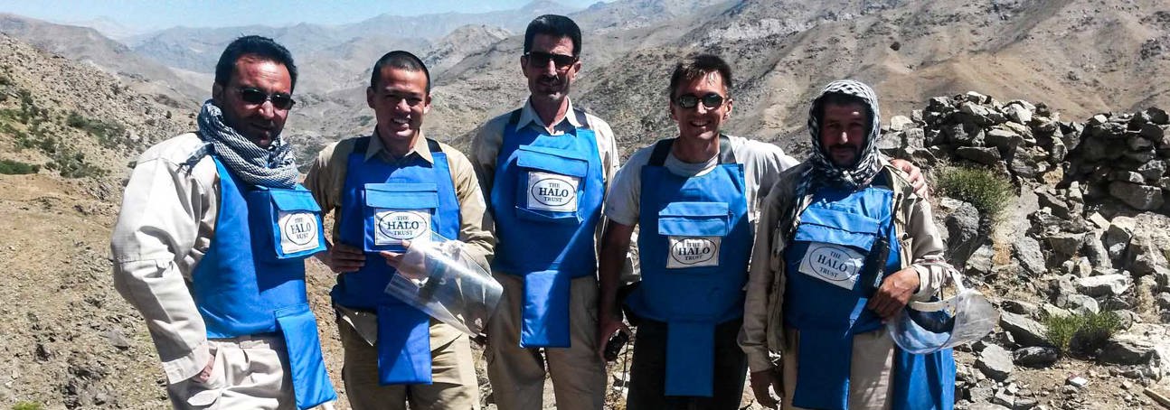 Tim Porter OBE, stands with a team of HALO deminers in Salang, Afghanistan