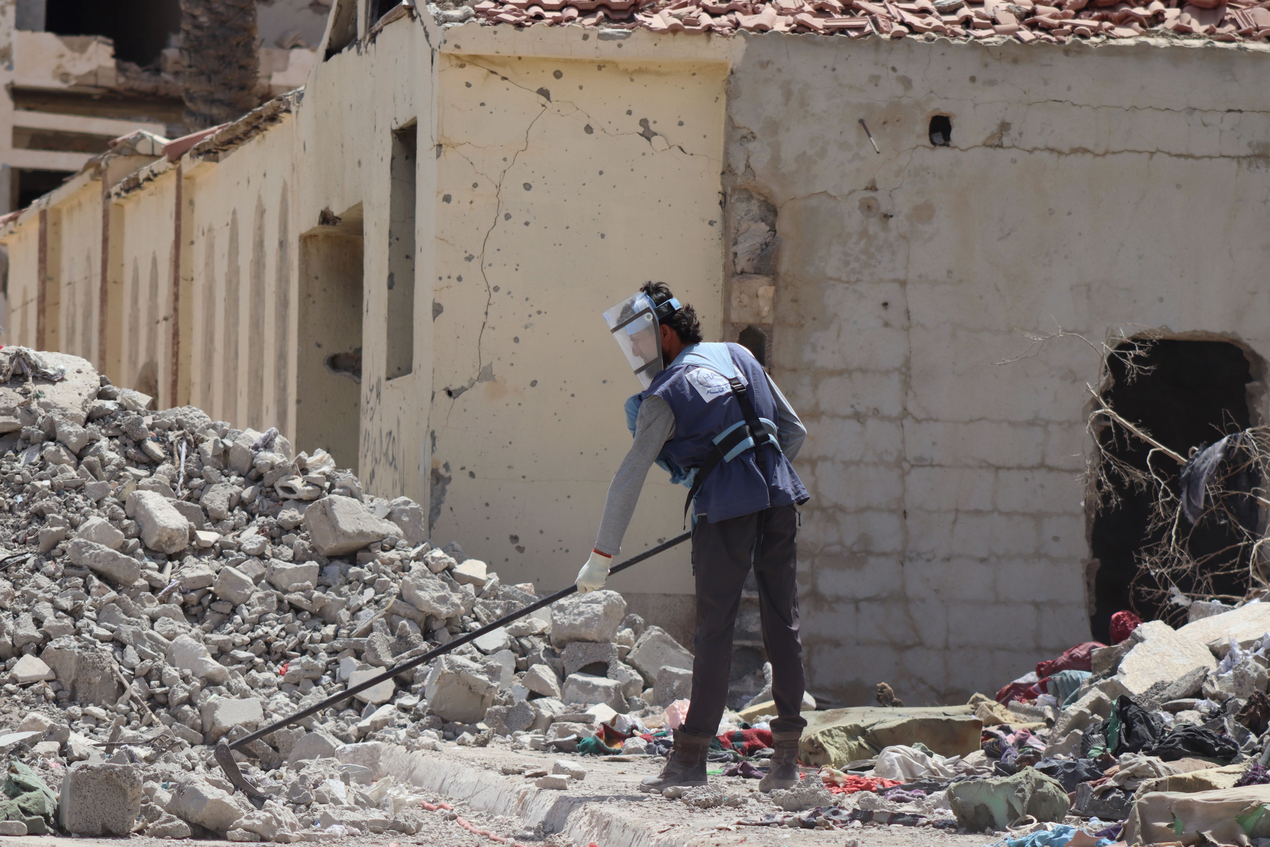 Person_Clearing_Rubble
