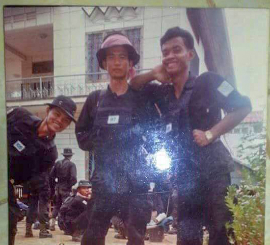 Mr Uch May, HALO Cambodia's longest serving staff member wearing navy uniform at the start of his career