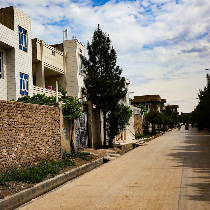 Modern houses and a paved street on a formerly contaminated site