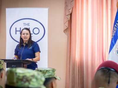 Woman standing at a lectern