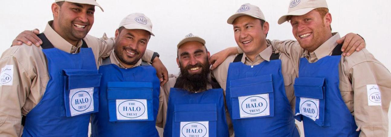 A team of dedicated deminers smile for a group photo following the clearance of districts in Herat Province, Afghanistan