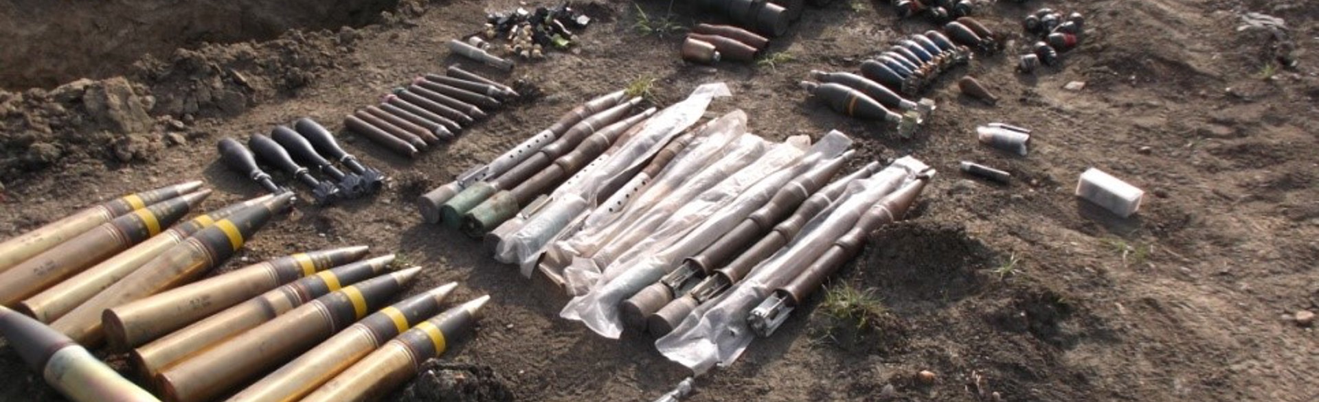 A collection of ammunitions lay on the ground