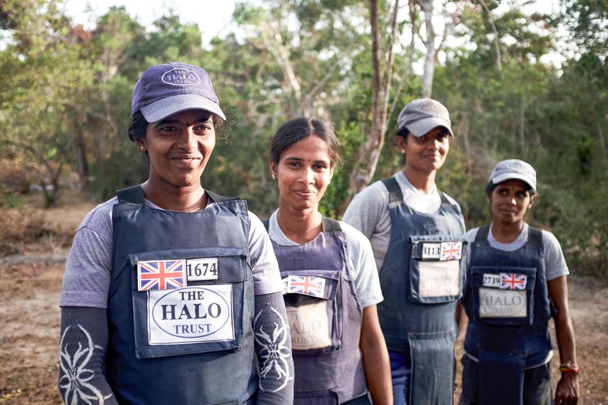 Women from Sri Lankas demining team pose in a line outside