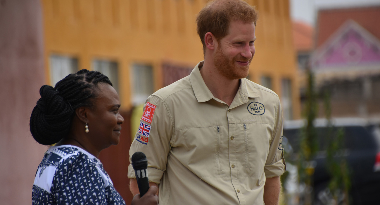 Prince Harry smiles during an interview on the street in Huambo, Angola