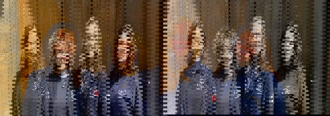 Group of 4 women wearing HALO Trust jumpers