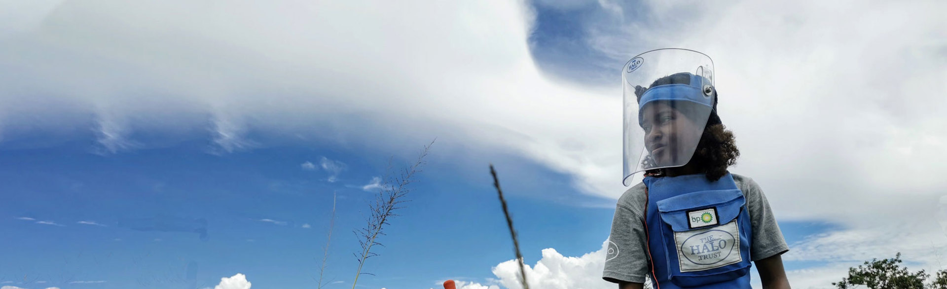 BP funded deminer carefully excavates a mine in a rural minefield in Angola