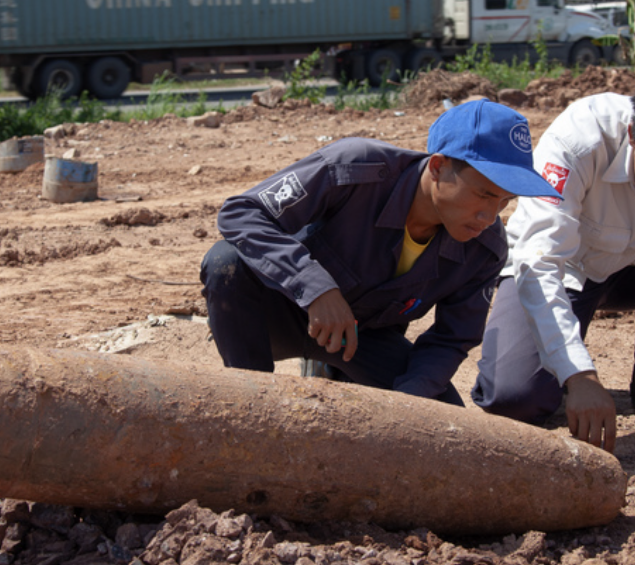 HALO staff member, Phouvanh, working on bomb disposal