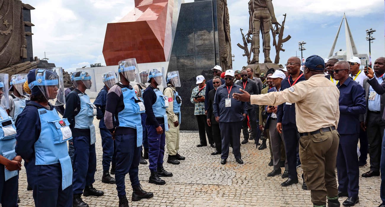 HALO Trust deminers conducting a mine clearance demonstration, wearing HALO uniform and PPE