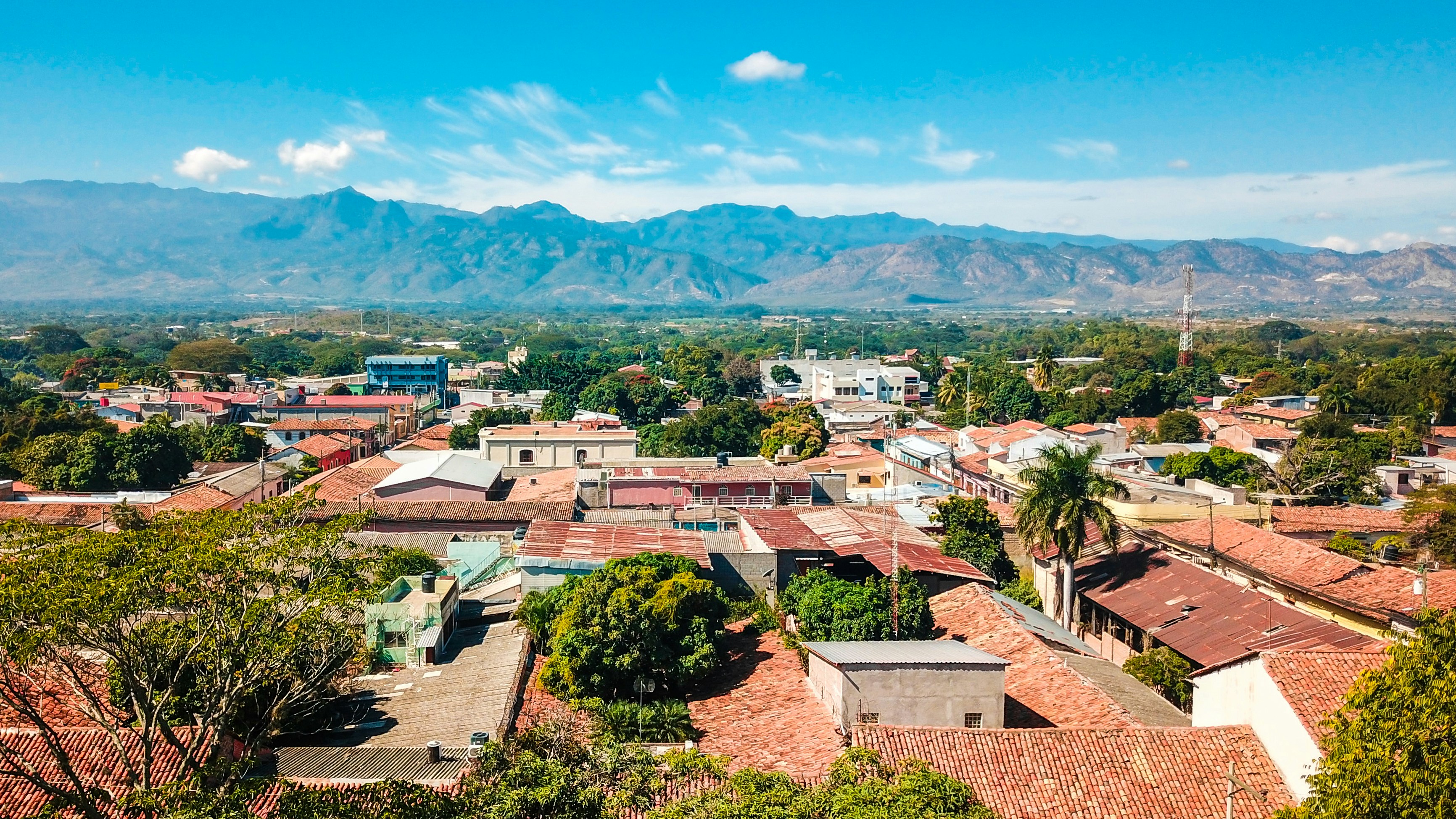 View of a Honduran city with mountains in the background