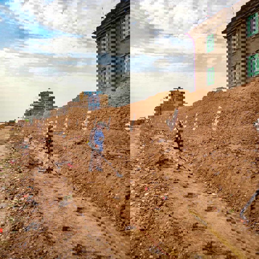 A HALO deminer uses a detector on a contaminated site in Afghanistan