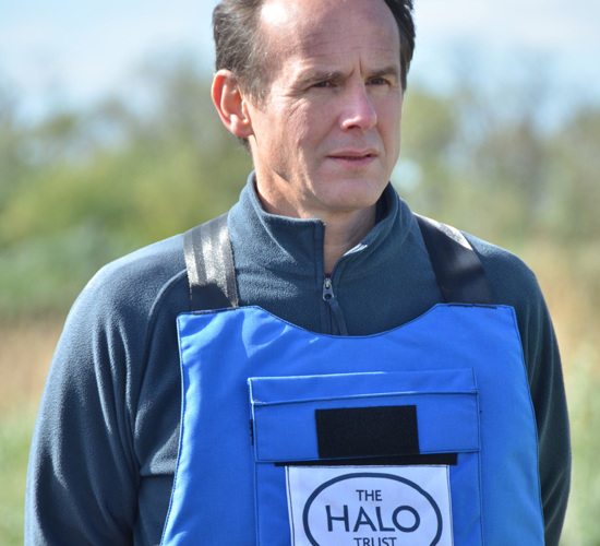 HALO CEO, James Cowan, wearing PPE on a minefield in Ukraine