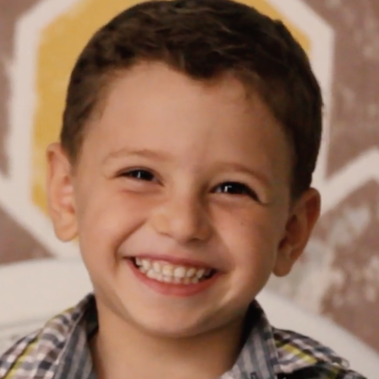 Omar smiles following the provision of a prosthetic limb by the HALO Trust