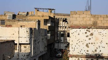 Bullet holes in buildings and walls in Taiz city, Yemen