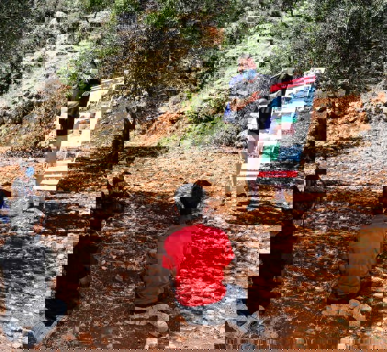 Children receiving an explosive ordnance risk education session in Syria