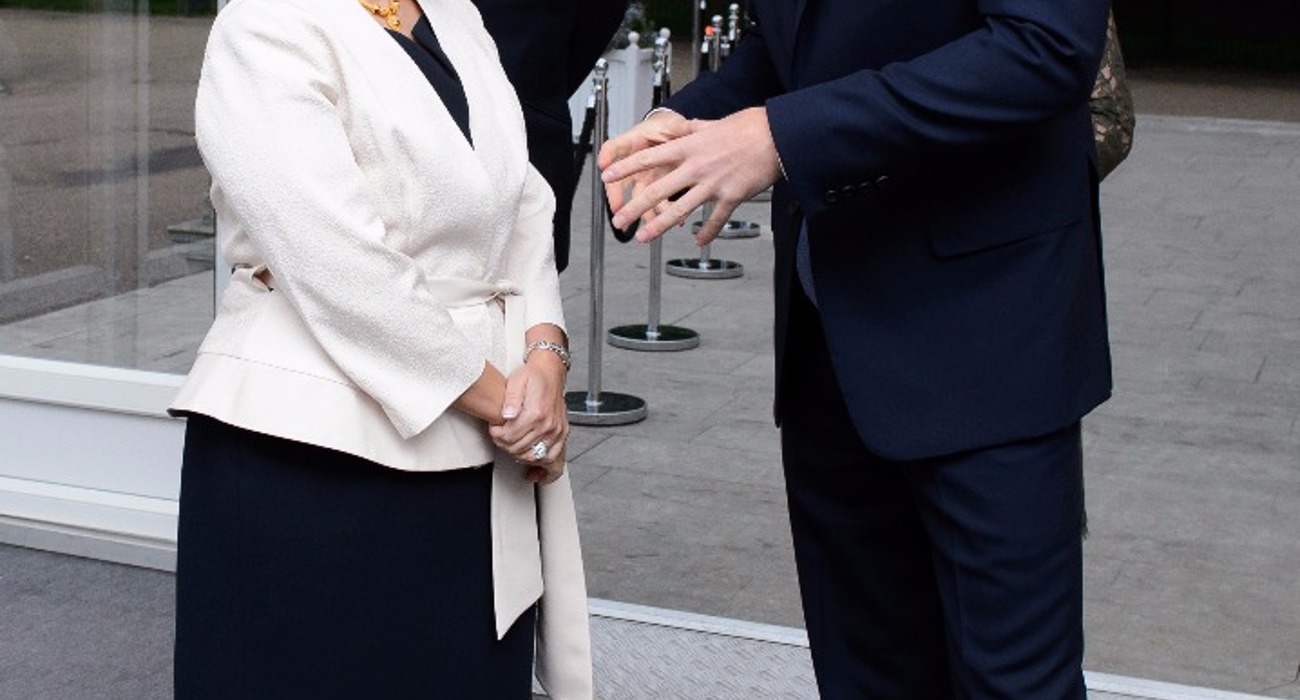 Former Secretary of State for International Development, Priti Patel talks with Prince Harry