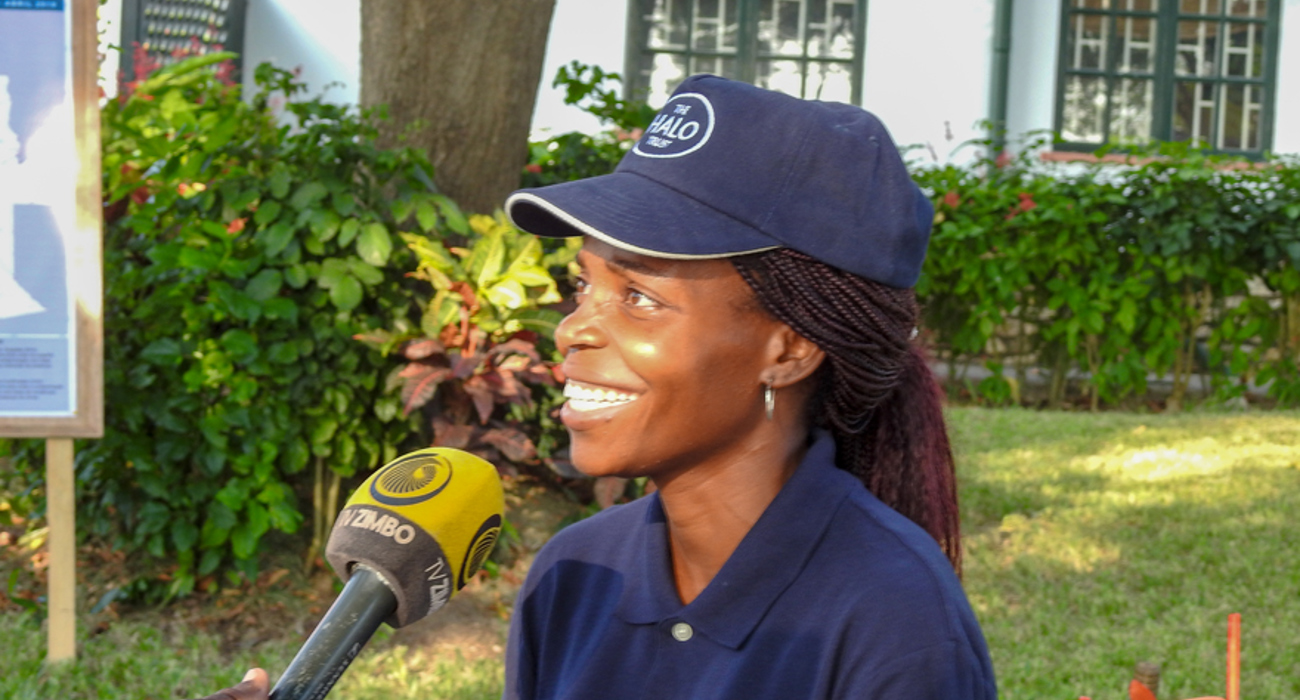 Suzana Soares, HALO Trust deminer and supervisor, giving a media interview during the BP Angola grant signing ceremony in Luanda, May 2019