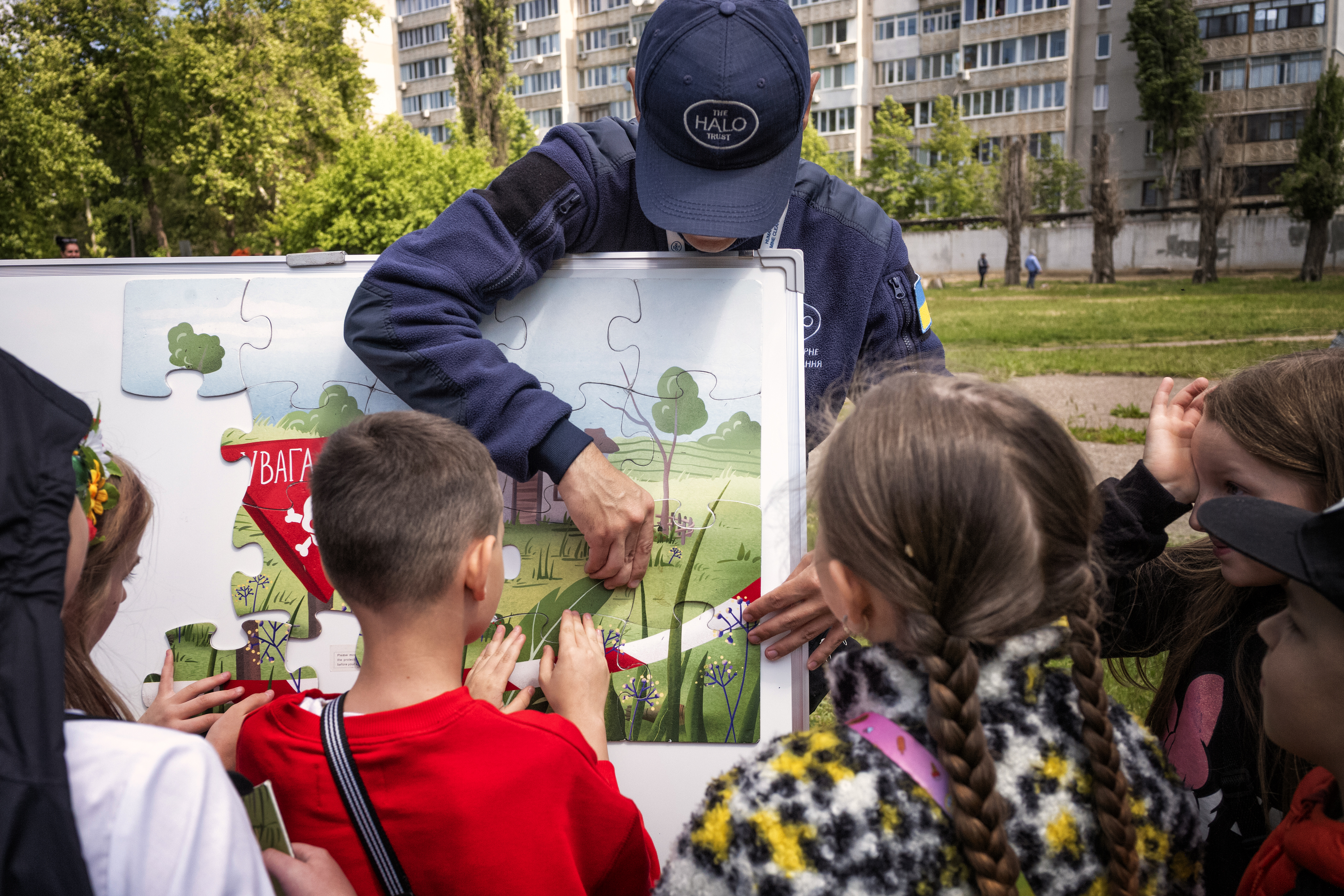 Children participate in an EORE session, completing a puzzle