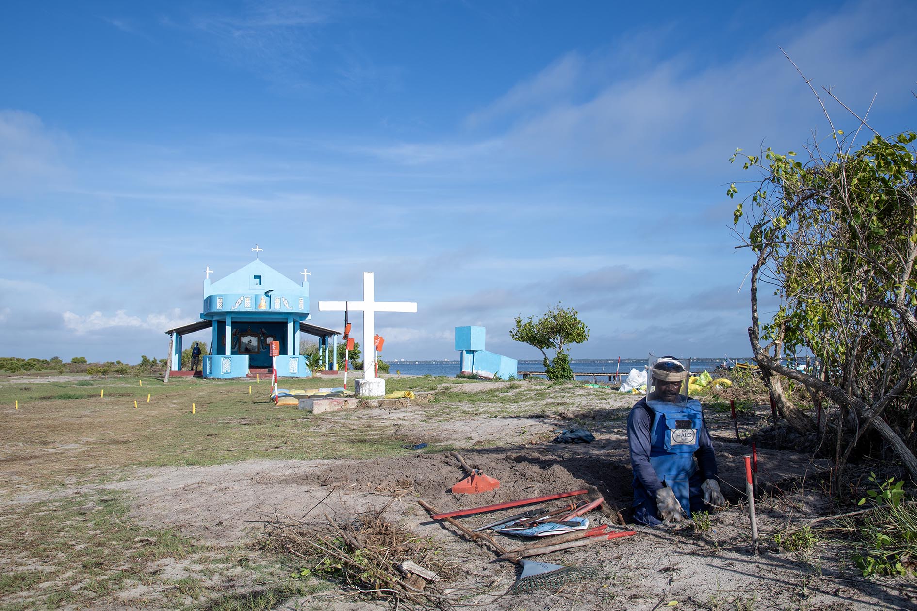 Deminer in front of Sri Lankan island church